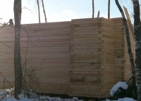 Стена дома из бруса 150x150