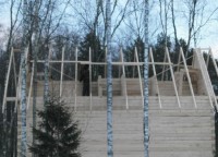 Укрепленная стропильная система дома из бруса
