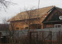 Обрешетка на стропильной системе дома с эркером
