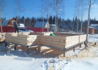 Постройка первого этажа брусового дома 7x8