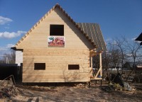 Пропилы под окна в стене брусового дома 8x8