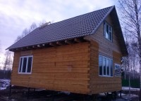 Обработка первого этажа брусового дома