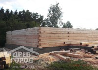 Стены первого этажа двухэтажного дома 8x9