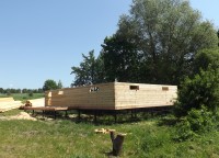 Возведение стен первого этажа на свайном фундаменте