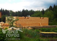 Пропил бруса первого этажа дома для будущих окон