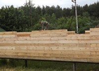 Стены первого этажа брусового дома