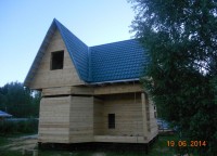 Эркер и терраса дома из профилированного бруса