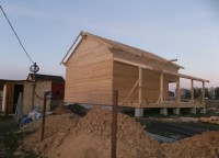 Брусовой дом на ленточном фундаменте 10,5x12