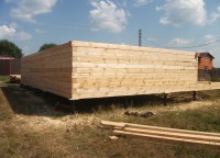 Стена первого этажа брусового дома 6x9