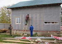 Обивка фасада дома гидроизоляцией