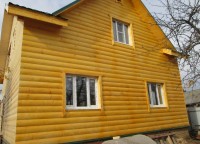 Фасад обитый фальшбревном