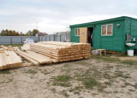 Подготовленный профилированный брус для строительства дома