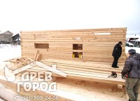 Подготовленный брус для строительства