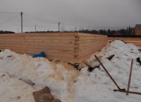 Стены первого этажа брусового дома