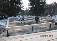 Винтовой фундамент брусового дома 12x12