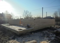Первый этаж брусового дома на свайном фундаменте 7x9