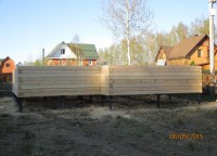 Возведение стен первого этажа брусового дома 8x8