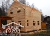 Готовый двухэтажный брусовой дом без кровли с выборками под окна и дверные проемы