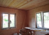 Установленные пластиковые окна в брусовом доме