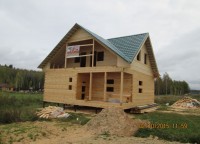 Металлочерепица на крыше брусового дома 9x9