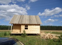 Брусовой дома из профилированного бруса с чернвой крышей