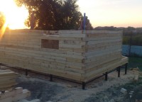 Стены первого этажа дома 7x7 из профилированного бруса
